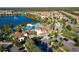 An aerial view of community center, pool, waterpark, and lake at 1979 Majorca Dr, Kissimmee, FL 34747