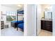 Tastefully decorated bedroom featuring a comfortable bunk bed and en-suite bathroom at 1979 Majorca Dr, Kissimmee, FL 34747