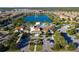 A beautiful community center overlooking a pond with fountain and houses surrounding the area at 1979 Majorca Dr, Kissimmee, FL 34747