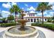 Community clubhouse and fountain; picturesque setting, lush landscaping, and a welcoming atmosphere for residents at 1979 Majorca Dr, Kissimmee, FL 34747