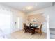 Cozy dining area features decorative wall art and modern table set perfect for gatherings at 1979 Majorca Dr, Kissimmee, FL 34747