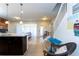Spacious and modern living room seamlessly connected to a stylish kitchen area at 1979 Majorca Dr, Kissimmee, FL 34747