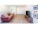 Cozy living room area with stylish furnishings and a modern television set up, great for entertainment at 1979 Majorca Dr, Kissimmee, FL 34747