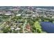 An aerial view of a home near a lake, Florida Mall, and 528 highway at 2028 Lake Christie Dr, Orlando, FL 32809
