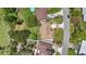 Charming single-Gathering home with a private driveway, lush greenery, and a convenient location on a quiet street at 2028 Lake Christie Dr, Orlando, FL 32809