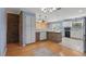 Spacious kitchen features breakfast bar and modern appliances at 2028 Lake Christie Dr, Orlando, FL 32809