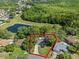 Beautiful home with clearly marked property line surrounded by greenery at 216 San Fernando Ct, Sanford, FL 32773