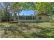 Spacious backyard featuring a screened sunroom, ideal for relaxation and entertaining at 216 San Fernando Ct, Sanford, FL 32773
