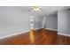 Spacious living room showcasing hardwood floors, ample lighting, and smooth transitions at 216 San Fernando Ct, Sanford, FL 32773