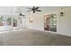 Spacious sunroom with two ceiling fans, sliding glass door, and ample natural light at 216 San Fernando Ct, Sanford, FL 32773
