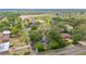 Overhead shot of home nestled among mature trees in a quiet neighborhood at 22 Hillcrest Dr, Babson Park, FL 33827