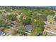 The property is surrounded by lush greenery, adding privacy and natural beauty at 22 Hillcrest Dr, Babson Park, FL 33827