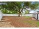 The backyard features a large tree at 22 Hillcrest Dr, Babson Park, FL 33827