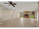 Spacious living room featuring a stone fireplace at 22 Hillcrest Dr, Babson Park, FL 33827