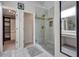 This bathroom features tile flooring, a glass shower, and a vanity at 2227 Doulton Dr, Orlando, FL 32812