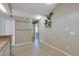 Open kitchen with tile flooring, neutral cabinets, and a functional layout at 2227 Doulton Dr, Orlando, FL 32812