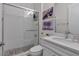 Modern bathroom featuring a glass-enclosed shower with tile surround and a sleek vanity with sink at 2233 Antilles Club Dr, Kissimmee, FL 34747