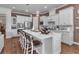 A modern kitchen featuring a large center island with seating and state-of-the-art stainless steel appliances at 2233 Antilles Club Dr, Kissimmee, FL 34747