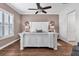 Relaxing main bedroom with a large white bed, wood floors, and plenty of natural light at 2233 Antilles Club Dr, Kissimmee, FL 34747