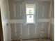 Well-lit bathroom with modern window and utility connections ready for customization at 2365 Zuni Road, St Cloud, FL 34771