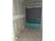 Unfinished bathroom under construction with a green tub, showing plumbing fixtures in place at 2365 Zuni Road, St Cloud, FL 34771