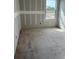Bright, unfinished bedroom with a window offering great natural light during the construction phase at 2365 Zuni Road, St Cloud, FL 34771