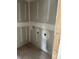 The laundry room features plumbing and electrical connections for efficient appliance setup at 2365 Zuni Road, St Cloud, FL 34771