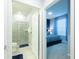 This bathroom showcases a toilet, vanity with granite countertop, and walk-in shower at 271 Jetty Way, Davenport, FL 33897