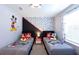 Mickey Mouse themed bedroom with twin beds at 271 Jetty Way, Davenport, FL 33897