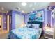 Charming 'Frozen' themed bedroom featuring a blue bedspread, themed art, and decorative snowflakes at 271 Jetty Way, Davenport, FL 33897