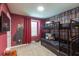 Fun bunk bedroom with a themed wallpaper and decor at 271 Jetty Way, Davenport, FL 33897