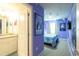Bright and colorful 'Frozen' themed bedroom connected to a bathroom at 271 Jetty Way, Davenport, FL 33897