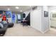 Entertaining game room with seating, air hockey, foosball table and superhero decor at 271 Jetty Way, Davenport, FL 33897