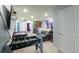 Spacious game room equipped with a foosball table and comfortable seating area at 271 Jetty Way, Davenport, FL 33897