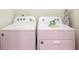 This laundry room features a Whirlpool washer and dryer set at 271 Jetty Way, Davenport, FL 33897