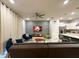 Spacious living room offering comfortable seating, recessed lighting, and a modern ceiling fan with open floorplan at 271 Jetty Way, Davenport, FL 33897