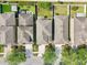 Bird's-eye view of rooftops and driveways showing the proximity to neighboring homes and street access at 2850 Pewter Mist Ct, Oviedo, FL 32765