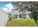 Spacious backyard with a fenced perimeter, patio, and screened-in porch at 2850 Pewter Mist Ct, Oviedo, FL 32765