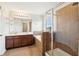 Bathroom with double vanity, soaking tub and enclosed shower offers a spa-like experience at 2850 Pewter Mist Ct, Oviedo, FL 32765