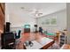 Large living area with hardwood floors and large windows providing ample natural light at 2850 Pewter Mist Ct, Oviedo, FL 32765