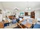 Bright and open living room and dining area with modern decor at 2850 Pewter Mist Ct, Oviedo, FL 32765