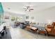 Comfortable living room with open floorplan and bright, natural light at 2850 Pewter Mist Ct, Oviedo, FL 32765