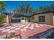 Spacious backyard featuring a tiled patio area perfect for outdoor entertaining at 332 N Lakeland Ave, Orlando, FL 32805