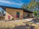 Exterior angle of home with black trim and front yard landscaping at 332 N Lakeland Ave, Orlando, FL 32805