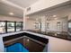 Open-concept design with kitchen view, abundant natural light, and spacious layout at 332 N Lakeland Ave, Orlando, FL 32805