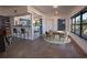 Open living and dining space with modern furnishings, a breakfast bar, and plenty of natural light at 332 N Lakeland Ave, Orlando, FL 32805