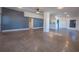 Spacious living area with an open concept, a neutral color palette, and seamless flow into the kitchen at 332 N Lakeland Ave, Orlando, FL 32805