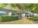 Charming townhome exterior with lush landscaping and private patios in a tranquil community at 3813 Black Spruce Ln, Winter Springs, FL 32708