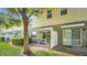 Cozy townhome exterior featuring private patios and peaceful outdoor space with mature trees at 3813 Black Spruce Ln, Winter Springs, FL 32708