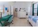 Bedroom featuring tile flooring and a writing desk at 410 E Victoria Trails Blvd, Deland, FL 32724